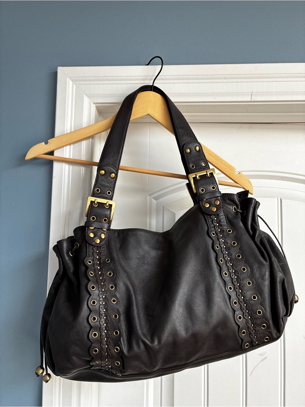 Hilary Radley Black Leather Shoulder Bag with Grommet Details
